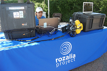 Rozalia Project educational booth with ROV Hector the Collector.